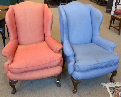 Lot 1556 - A Pair of George III Style Wing-Back Armchairs, late 19th/early 20th century, one upholstered...