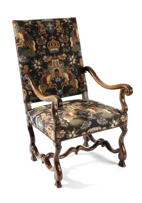 Lot 1560 - A 17th Century Style Anglo-Dutch Walnut Framed Open Armchair, recovered in needlework fabric...