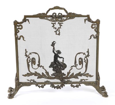 Lot 1566 - A Brass Firescreen, in Louis XV style, the mesh screen with applied decoration of acanthus...