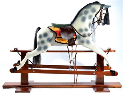 Lot 1571 - A Haddon Rocking Horse, of recent date, the dapple grey body with black natural horsehair and...