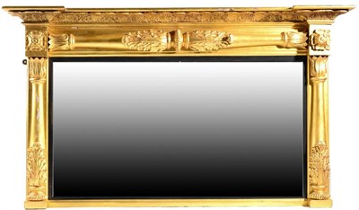 Lot 1579 - A Regency Gilt and Gesso Overmantel Mirror, early 19th century, of breakfront form with a...