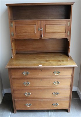 Lot 1583 - A Heals & Son Walnut Dressing Chest, the upper section with an open compartment above two...