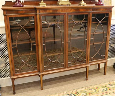 Lot 1589 - An Edwardian Mahogany and Boxwood Strung Breakfront Display Cabinet, early 20th century, with...