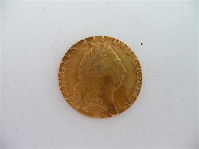 Lot 54 - George III Guinea 1793, generally good edge/surfaces, some reddish toning patches and ingrained...