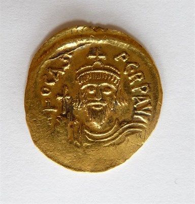 Lot 26 - Byzantine Gold Solidus of Phocas (602-610AD), obv. (O)N FOCAS PERP AVG around crowned facing...