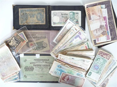 Lot 254 - An Accumulation of UK and Foreign Banknotes comprising: 29 x 10 shilling notes, O'Brien (Britannnia