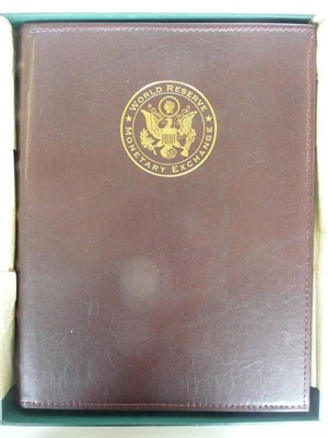 Lot 276 - 5 x De-luxe Leather-Bound Albums, each containing 4 sheets of uncut dollar bills: 4 x 1 dollar, 4 x