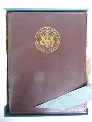 Lot 277 - 5 x De-luxe Leather-Bound Albums, each containing 4 sheets of uncut dollar bills: 4 x 1 dollar, 4 x