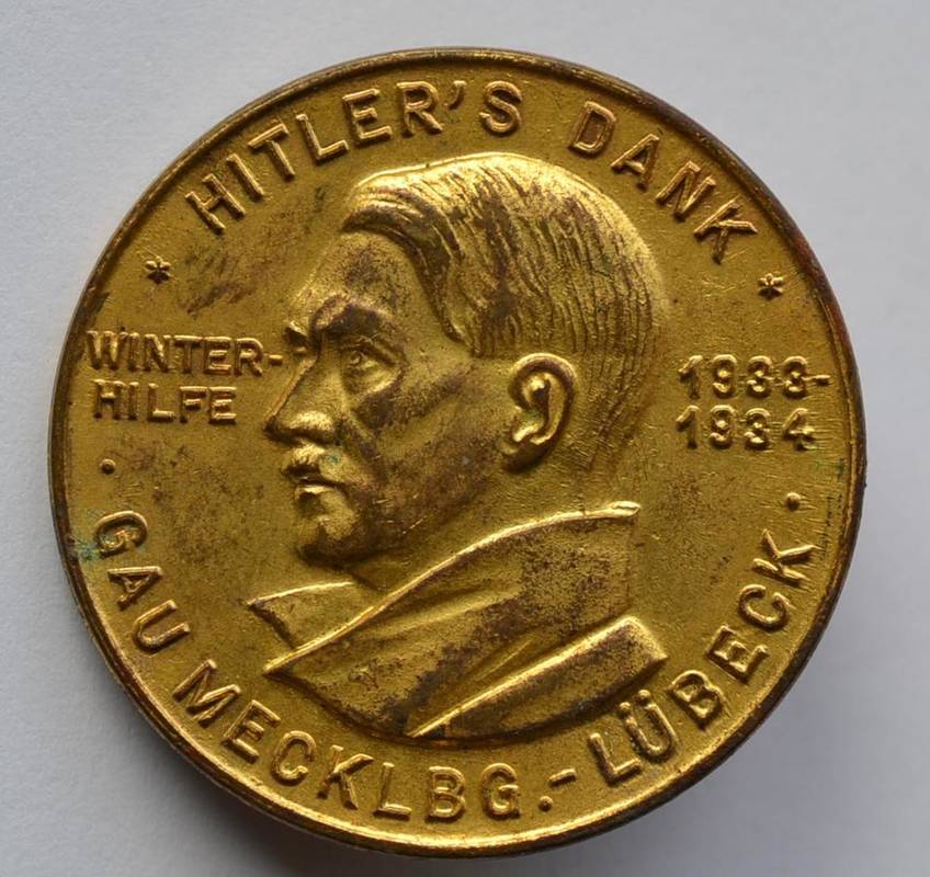 Lot 405 - Hitler's Dank' Badge, awarded as a token of appreciation for donations to the Winter Aid...