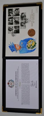 Lot 47 - A Commemorative Gold Coin Presentation Cover 'Queen's 80th Birthday 2006,' First Day Stamp...