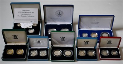 Lot 107 - 8 x UK Silver Proof Sets comprising: 3-coin piedfort set 2003 £2 'DNA,' £1 & 50p 'Women's...