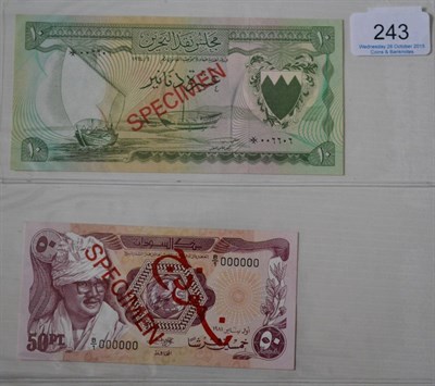 Lot 243 - 2 x Specimen Banknotes comprising: (1) Bahrain Currency Board 10 dinars 1964 Arabic serial No...