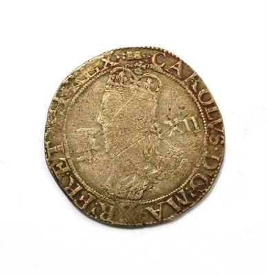 Lot 21 - Charles I, Shilling Aberystwyth Mint, MM book; obv. Briot's older bust with plume in field in front