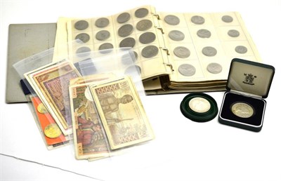 Lot 170 - An Album Containing a Large Collection of 200+ Rhodesia & South Africa Coins, including...