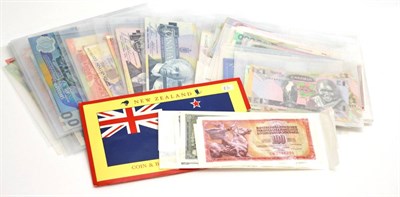 Lot 246 - A Collection of 100+ Foreign Banknotes: New Zealand, Canada, South America, Far East etc,...