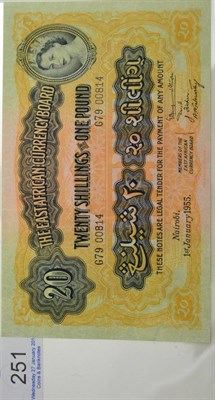 Lot 251 - The East African Currency Board 20 Shillings' Nairobi 1 Jan 1955, blue/black on orange/yellow...