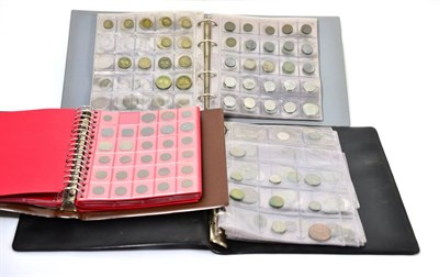 Lot 64 - 500+ Foreign Coins, mostly 20th century, housed in three albums, a couple silver including...