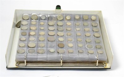 Lot 155 - An Album Containing a Collection of 390+ Foreign Coins including 56 x silver (weight 290g), various