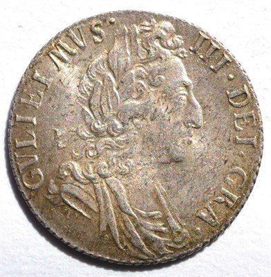 Lot 302 - William III Sixpence 1697, third draped bust, later harp, large crowns, GVLIEIMVS instead of...