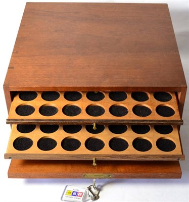 Lot 407 - A Mahogany Coin Cabinet, 32.5cm x 30cm x 15cm, containing 10 trays with double-holed spaces for 420