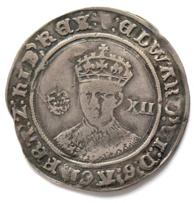 Lot 4 - Edward VI Shilling, fine silver issue (1551-53) MM tun; facing bust, rose to left & value XII...