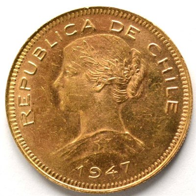 Lot 122 - Chile, Gold 100 Pesos 1947, obv. laureate female head symbolising the Republic, rev. star on...