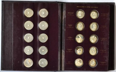 Lot 338 - The Genius of Michelangelo' a complete set of 60 silver medals depicting paintings, drawings,...