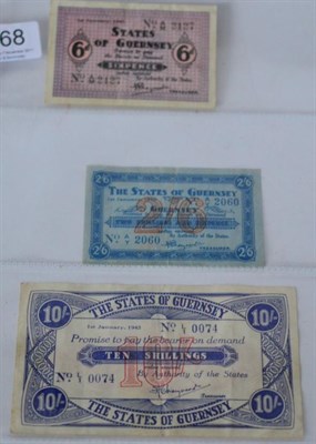 Lot 368 - Guernsey, 3 x Rare WW11 Banknotes comprising: 10 shillings 1.1.1943, L/1 0074, vertical centre...