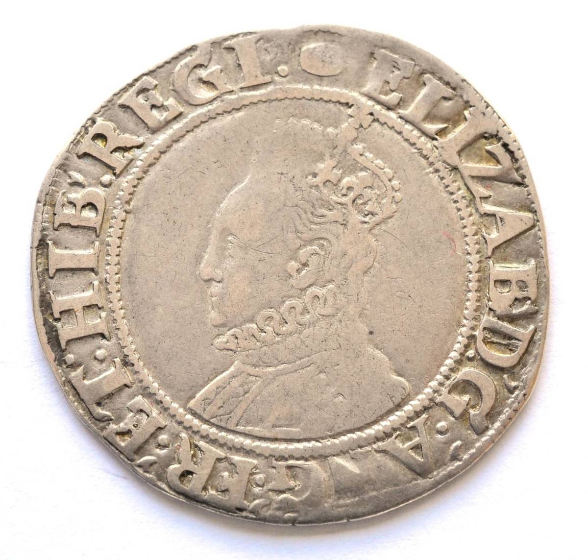 Lot 12 - Elizabeth I Shilling, sixth issue without rose or date, MM tun; sixth bust (ear shows); full, round