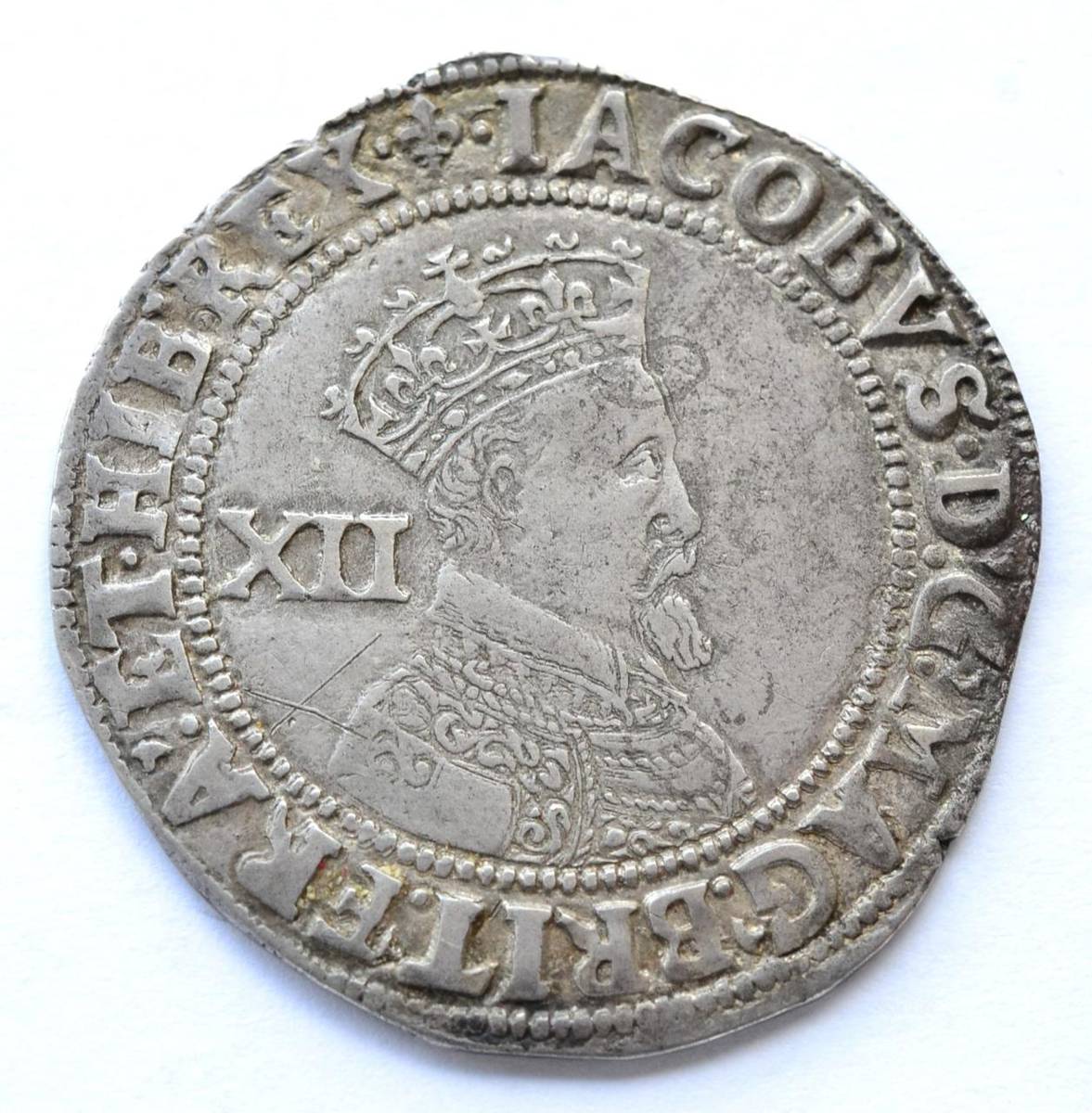 Lot 13 - James I Shilling, second coinage, third bust, MM lis; obv a couple of light scratches in field...
