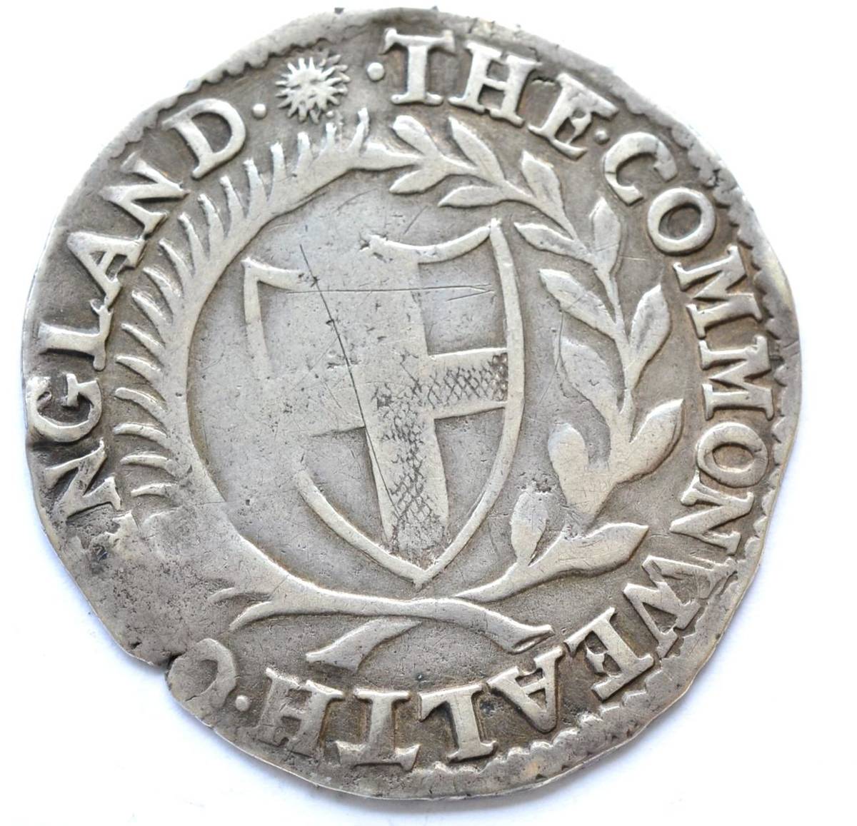 Lot 35 - Commonwealth Shilling 1651, MM sun; obv. Irish shield weak & rev scratches on shield o/wise Fine