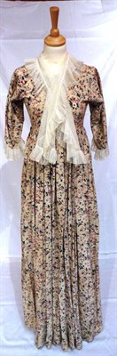 Lot 8 - A Circa 1810 Cotton Floral Printed Day Dress, with three quarter length sleeves and lace...