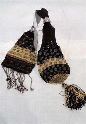 Lot 17 - A Late 19th Century Large Miser Purse, woven with black and yellow threads and squares of steel cut
