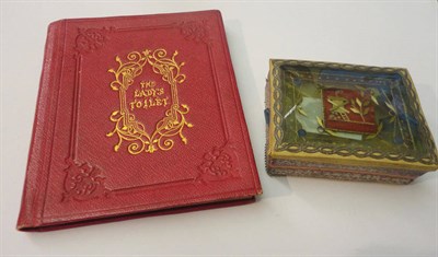 Lot 19 - A 19th Century Red Leather Bound Book 'The Lady's Toilet' by Rock Brothers & Payne, with gilt...