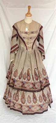 Lot 24 - A Circa 1855 Printed Paisley Two Piece, comprising a full skirt worn over a reproduction...