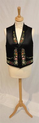 Lot 45 - A Gents 19th Century Black Silk Waistcoat, with petit point embroidery worked in a floral design to