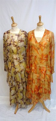 Lot 65 - Circa 1920's Orange Chiffon Printed Long Sleeved Drop Waist Dress, with a tiered skirt, v...