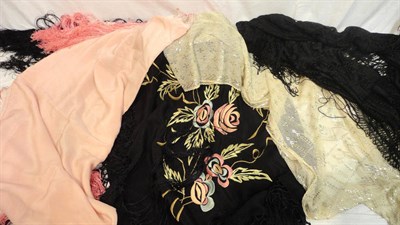 Lot 68 - An Early 20th Century White Metal Woven Shawl, black silk shawl embroidered with flowers; pink silk