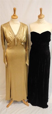 Lot 77 - A Circa 1930's Gold Lame Long Sleeved Evening Dress, with panelled sides and gathered detailing...
