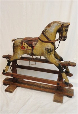 Lot 82 - Early 20th Century Possibly Ayres Small Dapple Grey Rocking Horse, on a swing stand with a...
