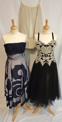 Lot 97 - Circa 1950's 'Digby Morton' Strapless Evening Dress with navy applique on a navy starched...