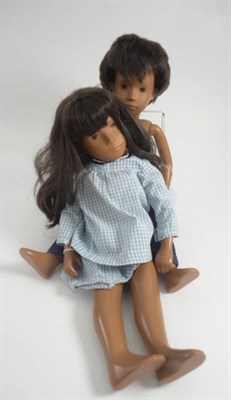 Lot 1001 - Sasha Doll with brown hair wearing a blue gingham checked dress; together with Gregor Doll with...
