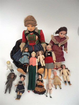 Lot 1005 - Assorted Dolls including a doll with pressed felt face, side glancing eyes, fabric body, fully...