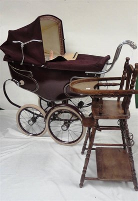 Lot 1019 - Silver Cross Burgundy Painted Dolls Pram with cream leatherette lining, canvas hood, chrome...