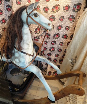 Lot 1026 - Late 19th Century Dapple Grey Rocking Horse with painted eyes, leather saddle and bridle, real mane