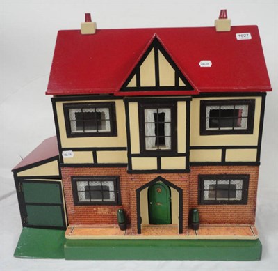 Lot 1027 - G & J Lines No 38 1931 Red Roof Dolls House, with a painted and papered facade and attached garage