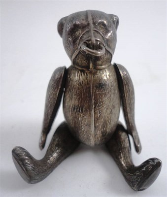 Lot 1050 - Silver Jointed Bear Pin Cushion wearing a muzzle, marked H V Pithey and Co, Birmingham 1909,  7...