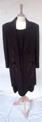 Lot 1079 - Catherine Walker Plum Suit comprising a sleeveless shift dress and long line jacket with bow detail