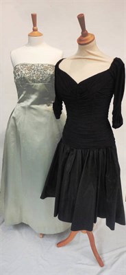 Lot 1093 - Circa 1950's Cecil Chapman Cocktail Dress with full black silk taffeta skirt and ruched jersey...