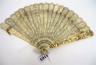 Lot 1165 - Carved Ivory Brisee Fan pierced and carved with figures,  nineteen sticks and two guards, 19 cm